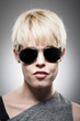 © camrocker - Beautiful Young Caucasian Woman Wearing Aviator Sunglasses