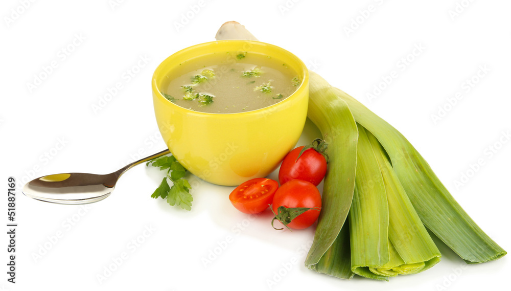 Diet soup with vegetables in cup isolated on white