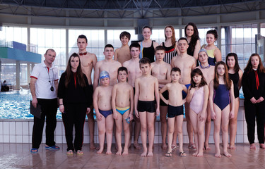 Wall Mural - happy children group  at swimming pool