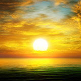 Fototapeta Zachód słońca - sunrise over the sea