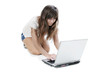 © Sławomir Fajer - Young woman working with laptop on white background