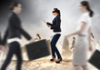© Sergey Nivens - Businesswoman in blindfold among group of people