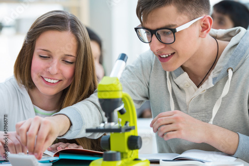 Fotografie, Tablou High School students. Girl and boy working together at biology c