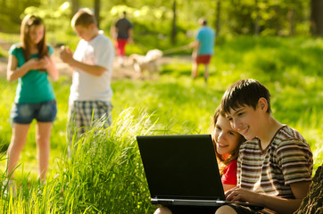 Wall Mural - Teenagers having fun in the nature on sunny spring day