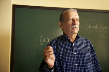 School people, professor talking to students during lesson in co