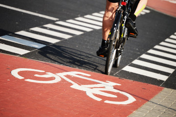 Wall Mural - Bicycle road sign and bike rider