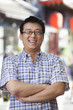 © xixinxing - Laughing Mid Adult Man With Glasses in Nanluoguxiang, Beijing