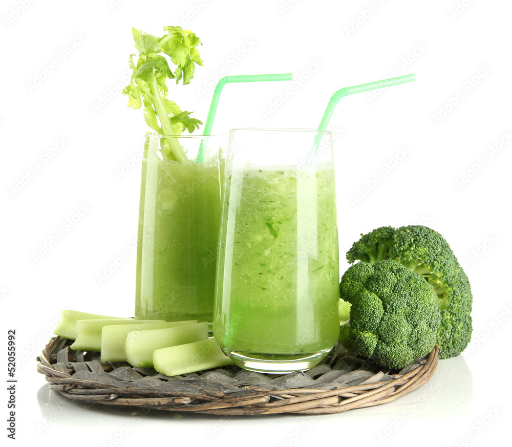 Glasses of green vegetable juice, isolated on white