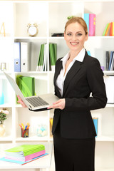 Wall Mural - Portrait of teacher woman in classroom