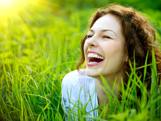 Wall Mural - beautiful young woman outdoors. enjoy nature