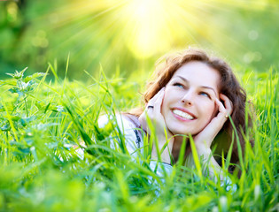 Wall Mural - beautiful young woman outdoors. enjoy nature