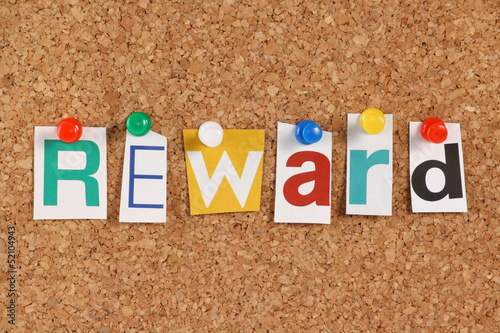 Fotografía The word Reward in cut out magazine letters