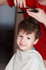 Boy with mother haircut