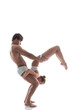 © Wisky - Duo of acrobats showing trick, isolated on white