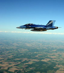 Canvas Print - Jet figter flying at high altitude