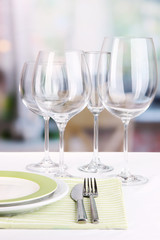 Wall Mural - Table setting with glasses for different drinks