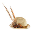 Hunting hat with pheasant feathers isolated on white background.