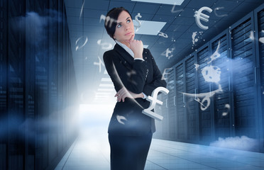 Poster - Businesswoman standing in data center with currency graphics