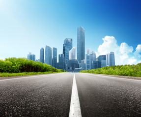 Wall Mural - asphalt road and modern city