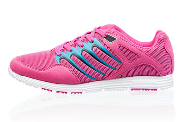 Pink female sneaker isolated over white