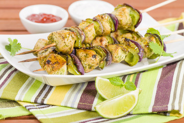 Wall Mural - Lime, Mint & Coriander Chicken Kebabs. Barbeque food!