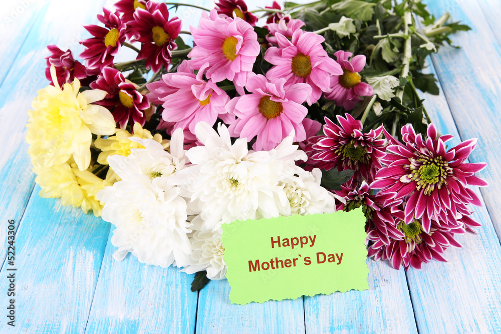 Bouquet of beautiful chrysanthemums on table close-up
