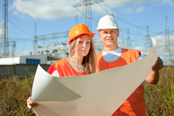 Wall Mural - two workers at electric power plant