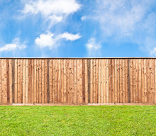 Wooden Fence At The Grass
