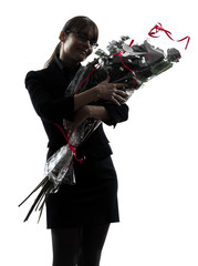 Poster - business woman hugging flowers bouquet silhouette