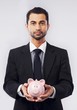 © Jacob Lund - Businessman and His Piggy Bank