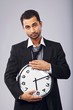 © Jacob Lund - Male Office Worker with a Wall Clock