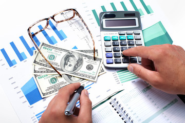 Aufkleber - Hand with calculator and money.