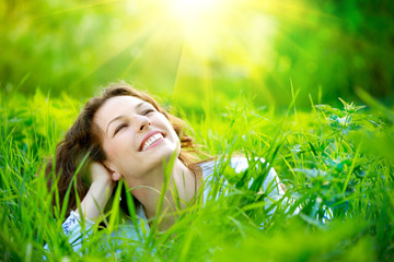 Wall Mural - young woman outdoors. enjoy nature