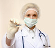 © lenets_tan - Medical doctor with syringe, isolated on white background