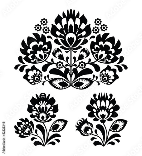 Fototapeta na wymiar Folk embroidery with flowers - traditional polish pattern