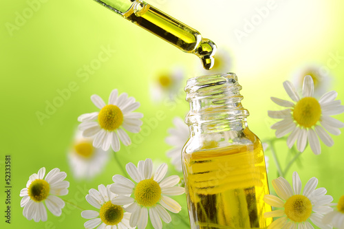 Fotografie, Obraz Drop falling from dropper of essential oil