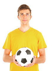 Young soccer player holding ball, isolated on white