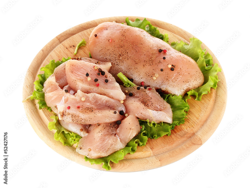 Chicken meat on board isolated on white