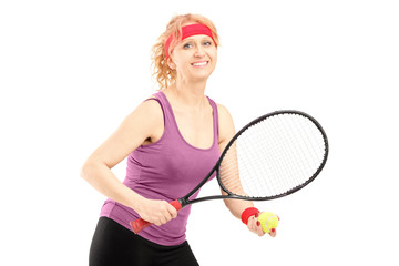 Sticker - Middle aged female holding tennis racket and ball