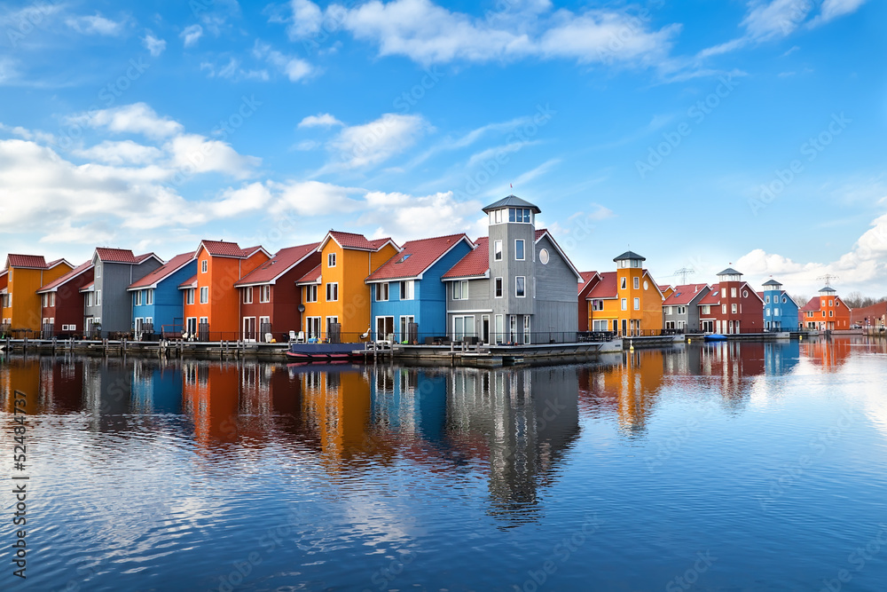 Reitdiephaven - colorful buildings on water - obrazy, fototapety, plakaty 