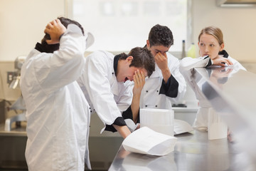 Tired chefs  waiting