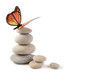 Leinwandbild Motiv Balanced stones with butterfly