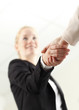 © sepy - Business woman shaking hands