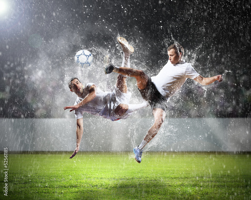 Naklejka na szybę two football players striking the ball