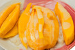 Thai style tropical dessert, glutinous rice eat with mangoes
