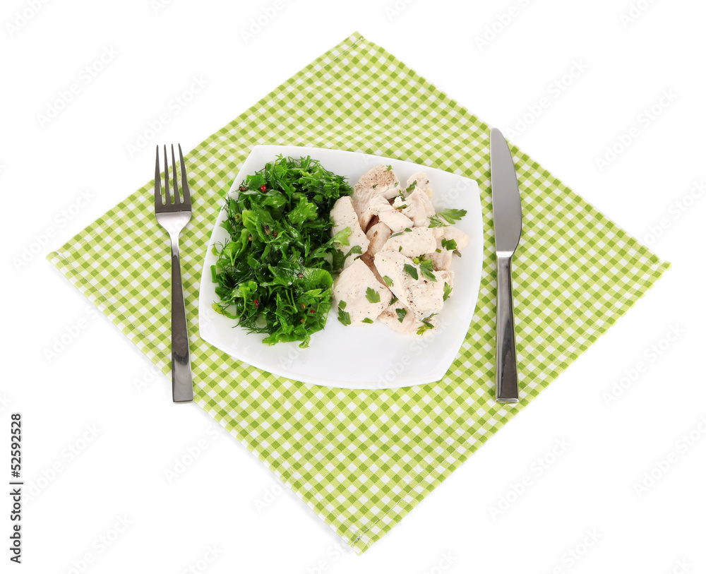 Boiled meat on plate on napkin isolated on white