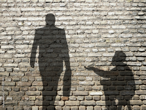 Fotomural Ombres de mendiant et negocios