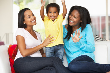 Wall Mural - Woman Visiting Pregnant Friend With Son At Home