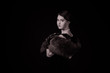 © ruslan1117 - The girl in the retro image of a black background