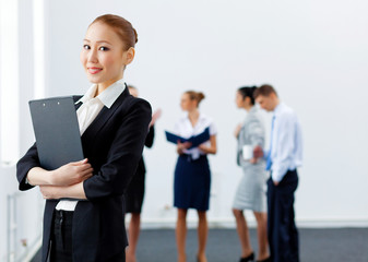 Asian pretty business woman with folder